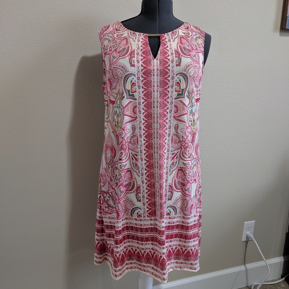 Haani Dresses & Skirts - Haani gently used pink print dress. Size L
